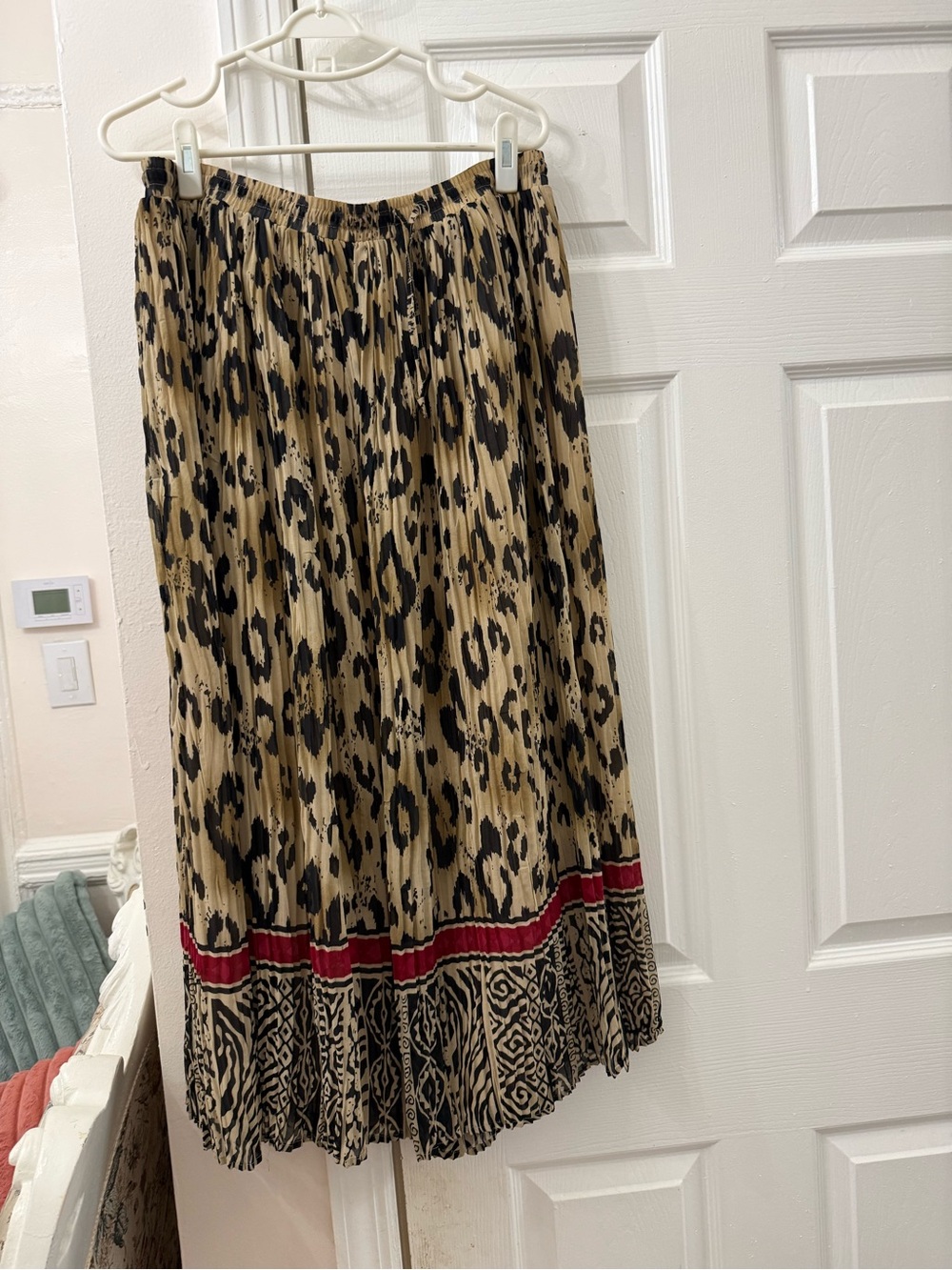 Pleated Leopard-Print Midi Skirt with Red Accent